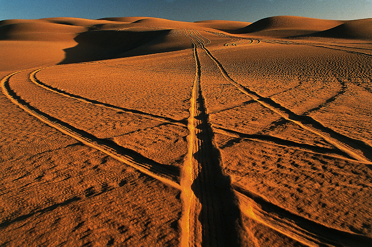 Tyre tracks in the sand of the Empty Quarter.