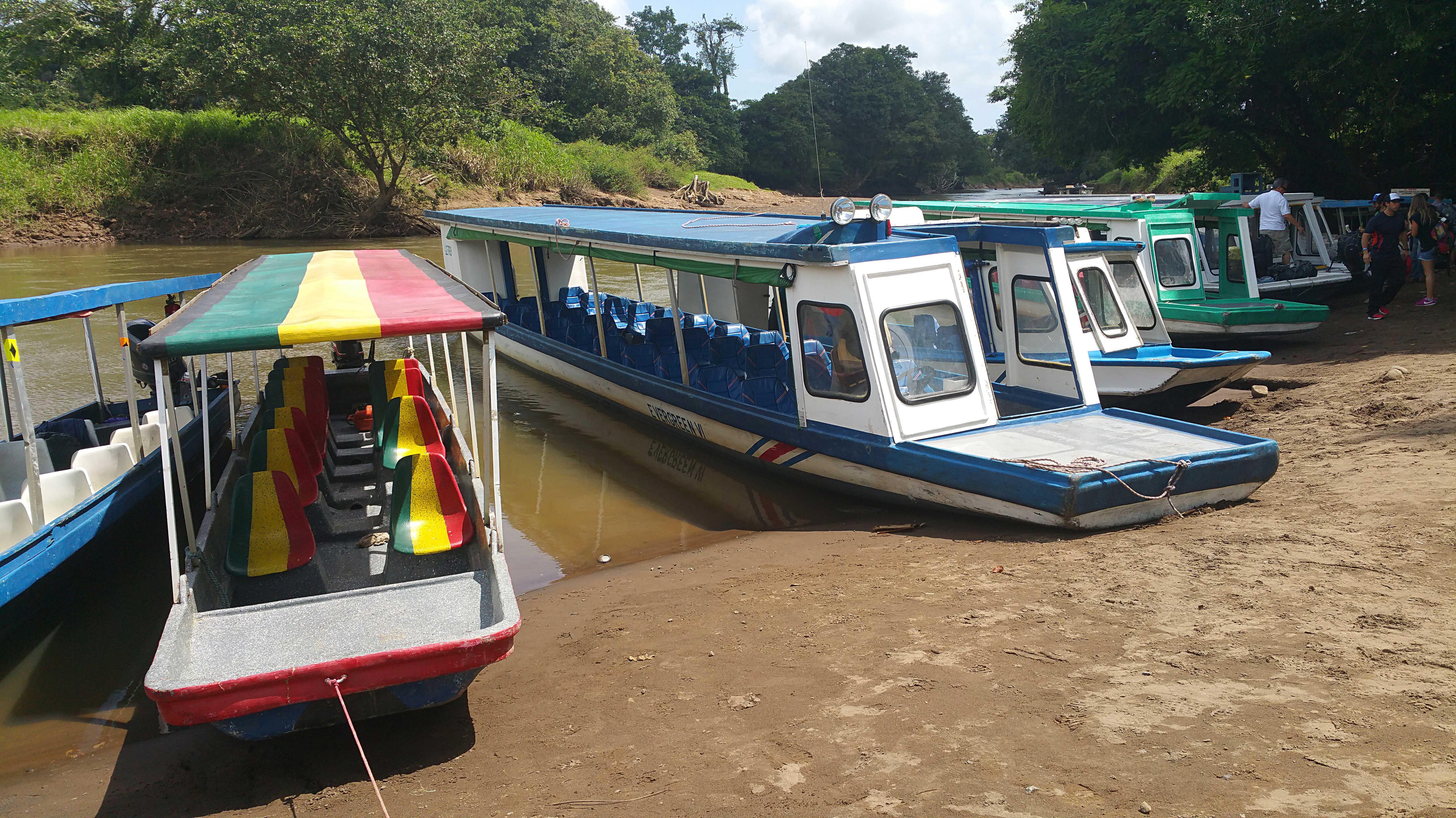 Water taxis transport tourists and locals to Tortuguero. Image by Bailey Johnson / Lonely Planet