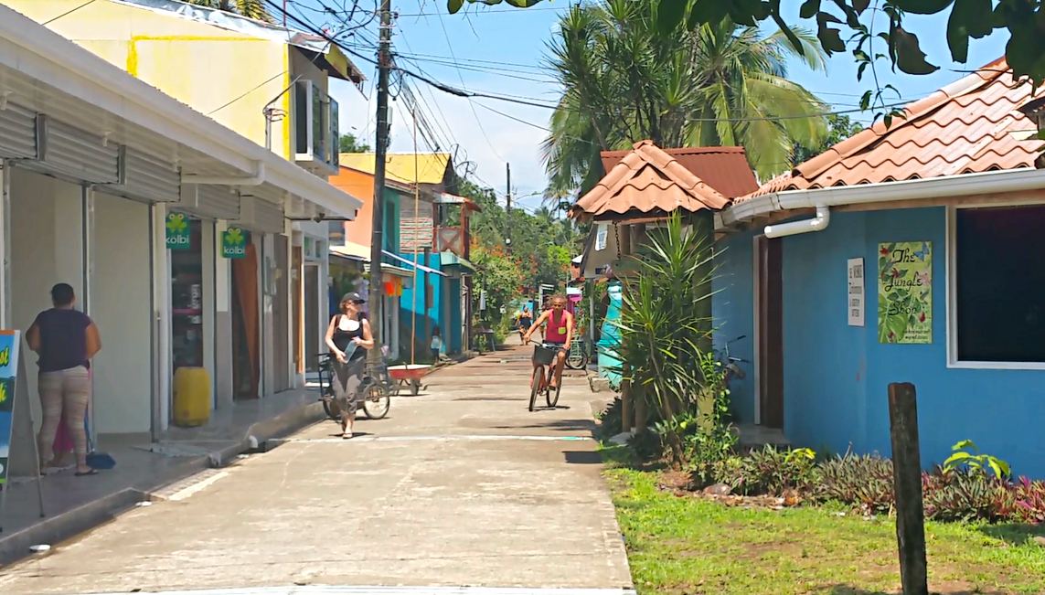 Tortuguero Village is a pop of color on the shores of the local lagoon. Image by Bailey Johnson / Lonely Planet