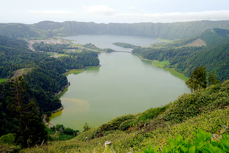 The twin green and blue crater lakes of Setes Citades are one of the Azores' best-known sights. Image by James Kay / Lonely Planet