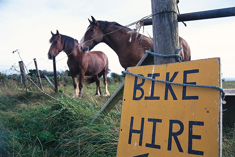 Visitors to Sark can choose from three transport options: foot, bike or horse. Image by Martin Kreuzer / LOOK / Getty Images.