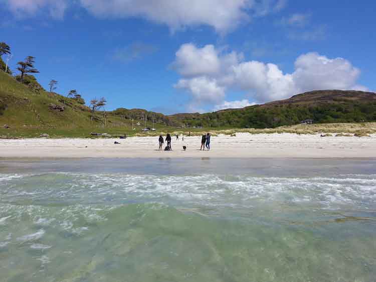 Calgary Bay, in Mull: the Scottish coastline can look almost Caribbean in the sunshine – though the water is usually a lot chillier. Image by James Smart / Lonely Planet.