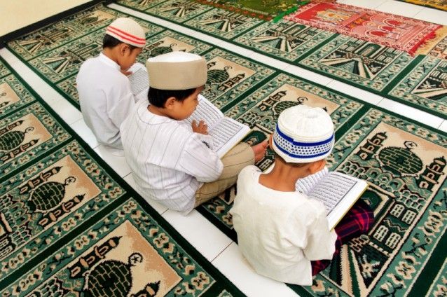 Boy's reading the Quran