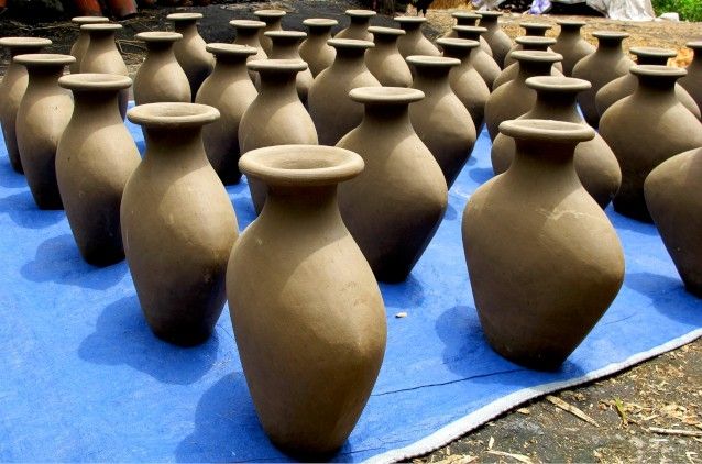 Newly made pots drying in the sun