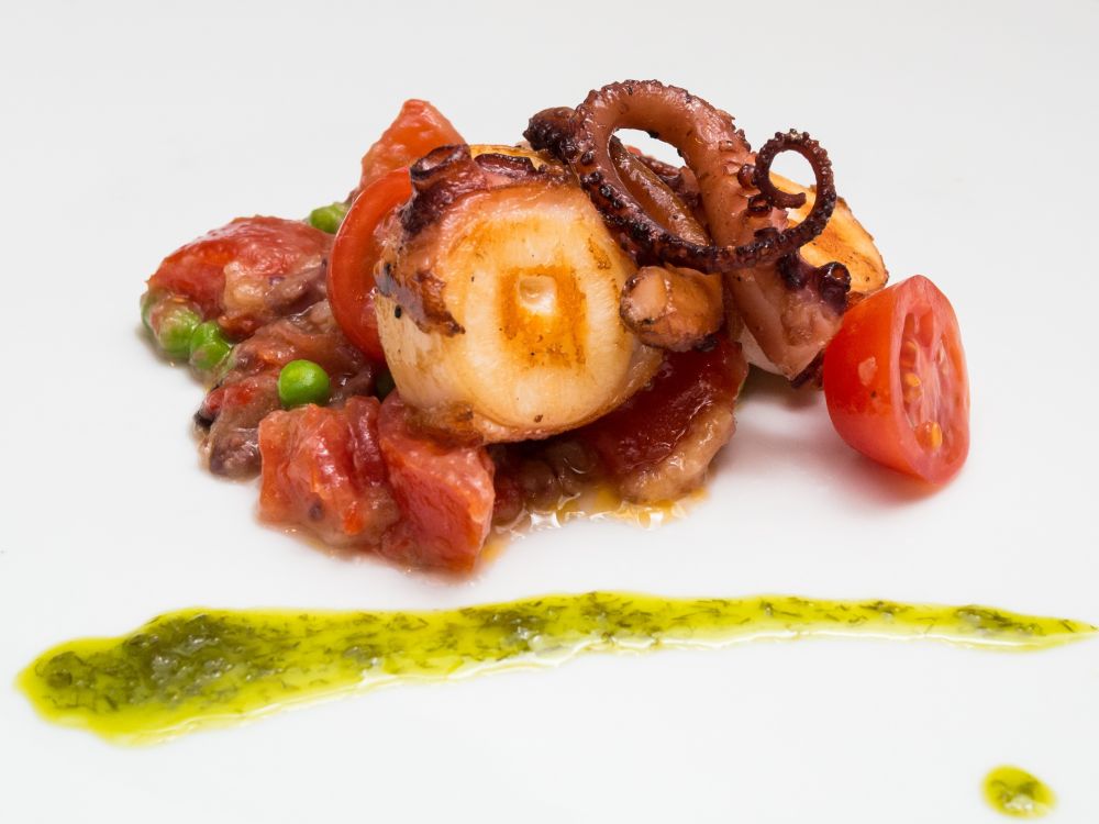 Ola - Spanish Octopus a la plancha" with peas, tomatoes and black olives- Photo Courtesy Savour