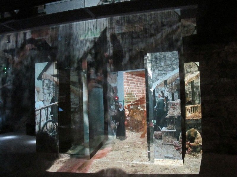 Smoke Screen Projecting Holographic Images of Medieval Marketplace Life