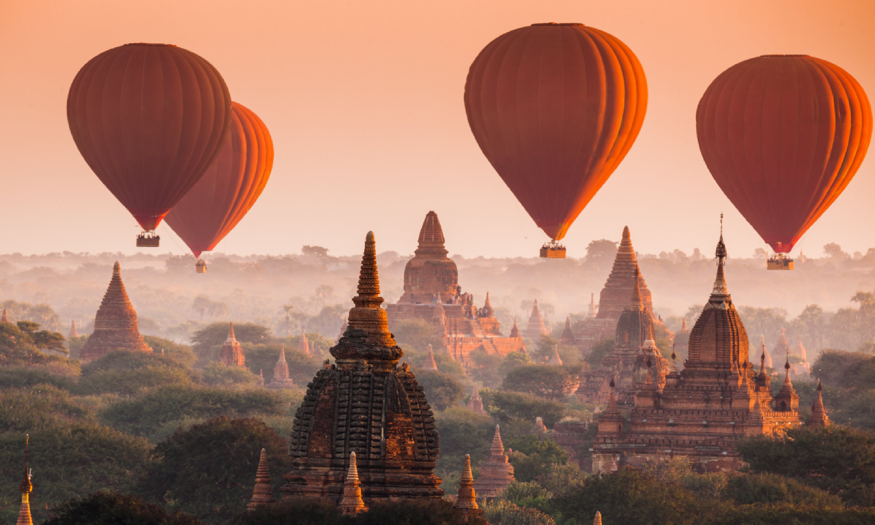 Hot air balloon over plain of Bagan (Shutterstock)