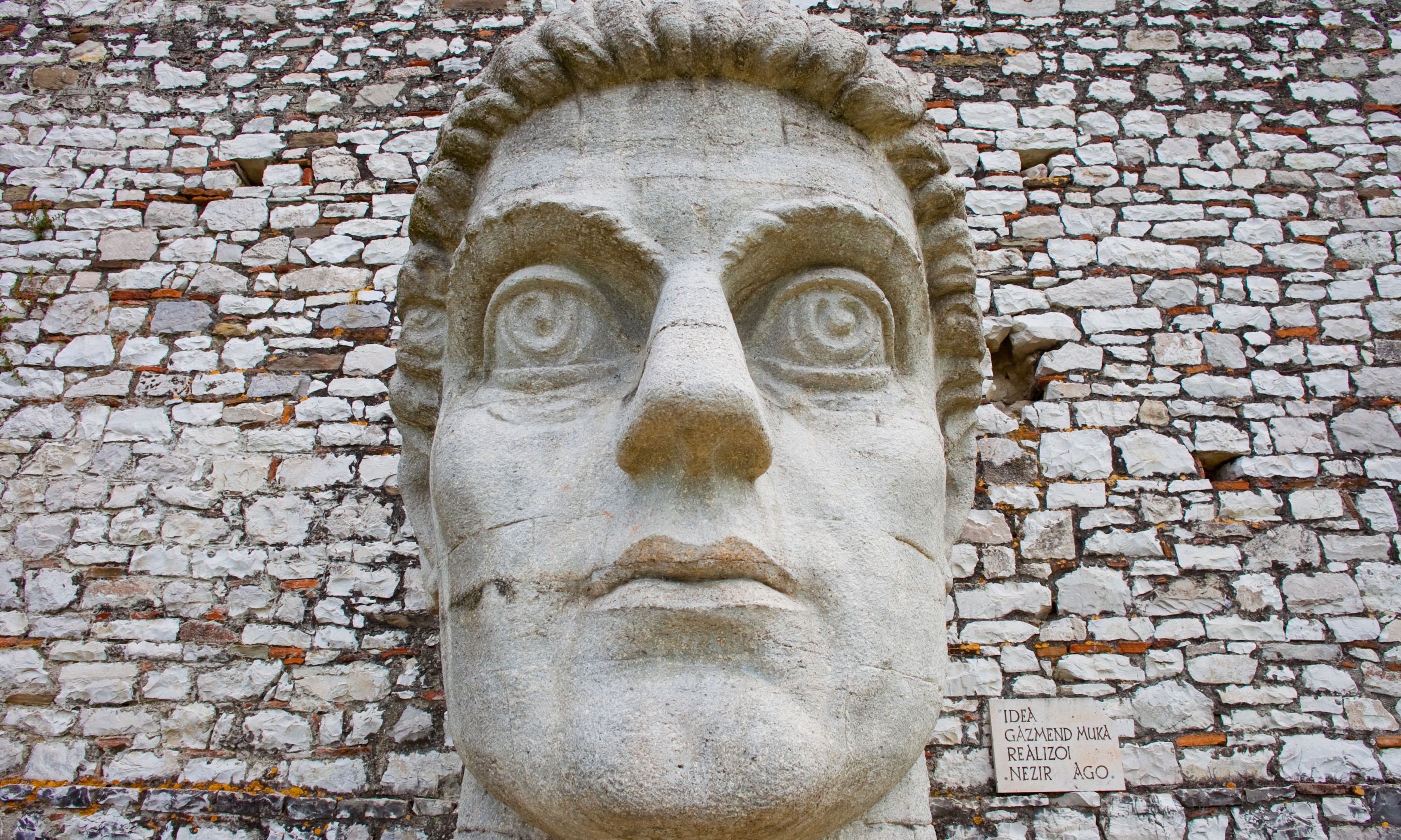 Giant Head in historic city of Berat (Shutterstock.com)