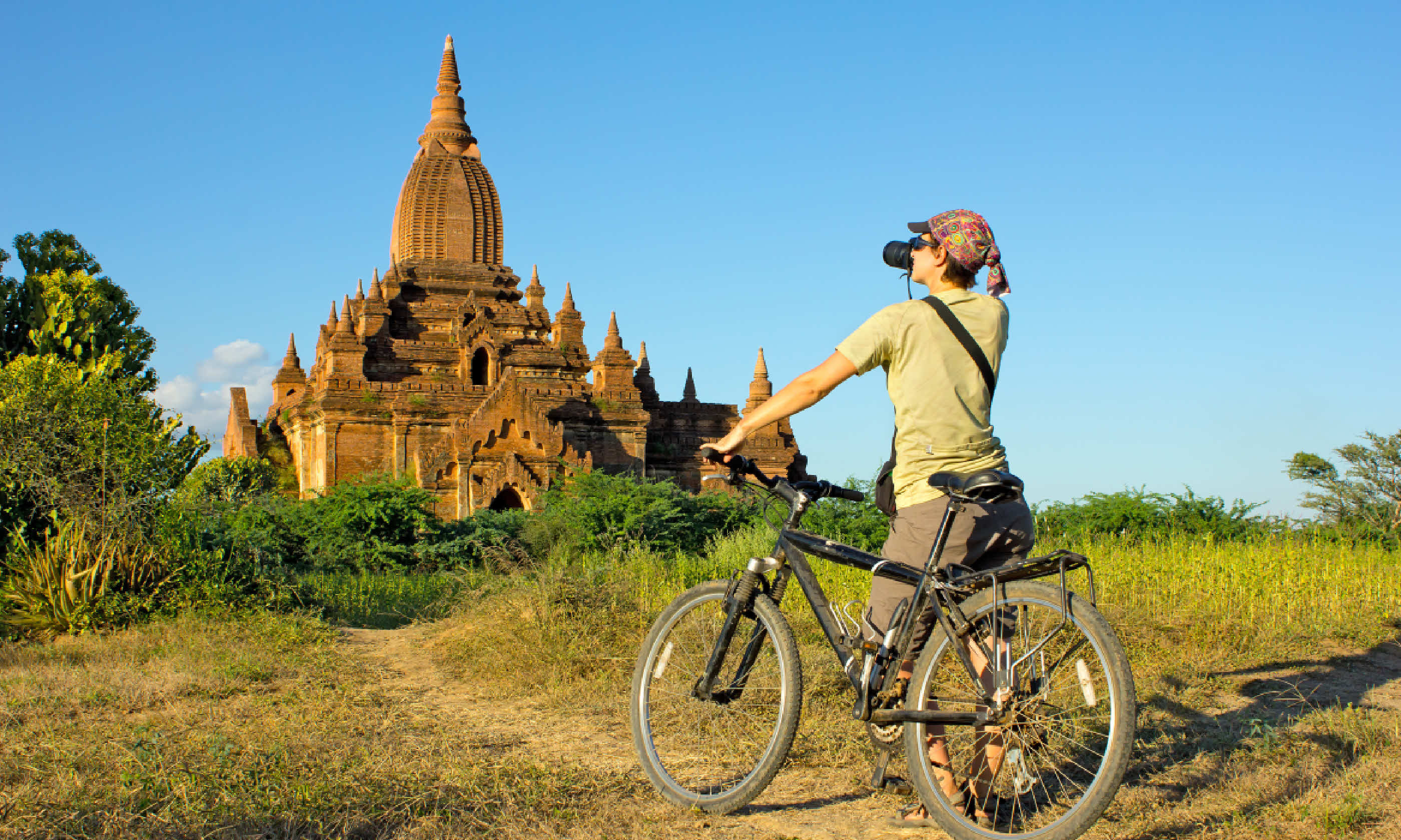 Photographer in Burma (Shutterstock)