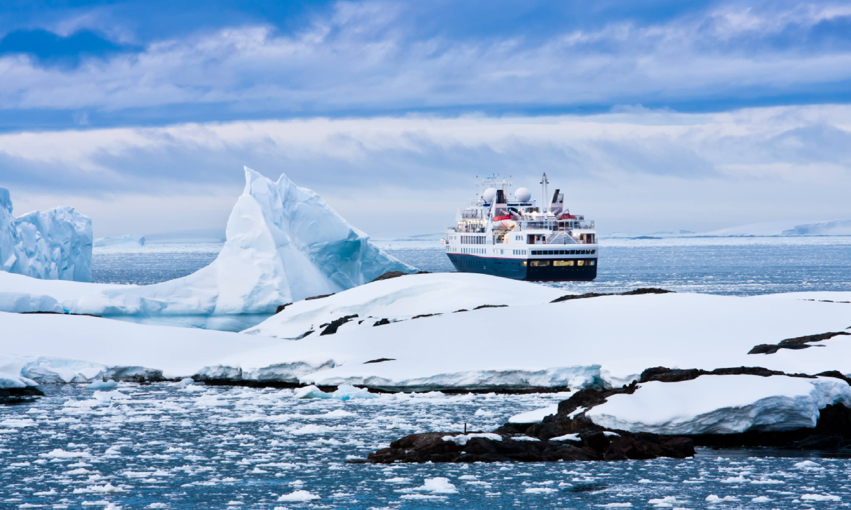 Cruise ship in Antarctic waters (Shutterstock: see credit below)