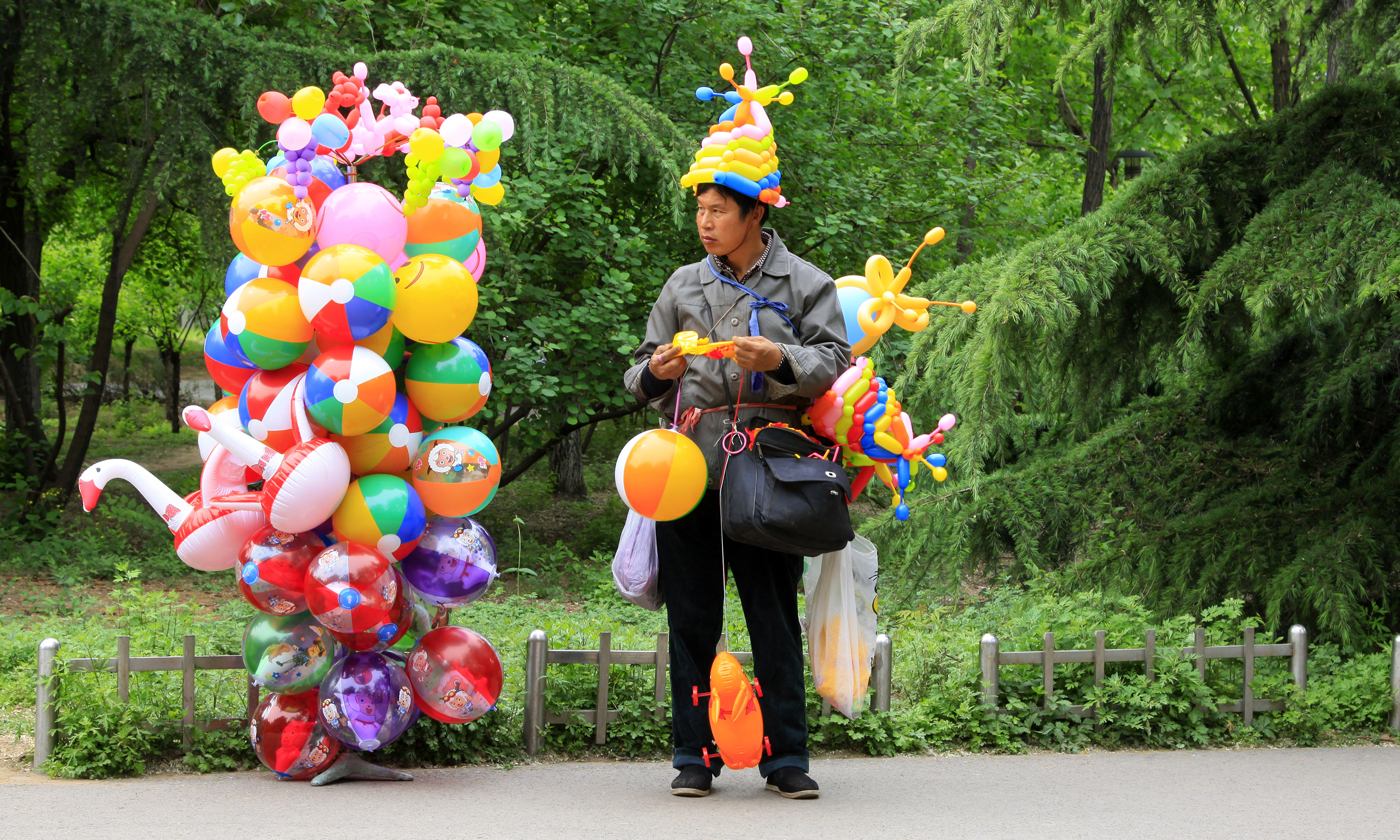 Chinese balloon seller (From Shutterstock.com. See below.)