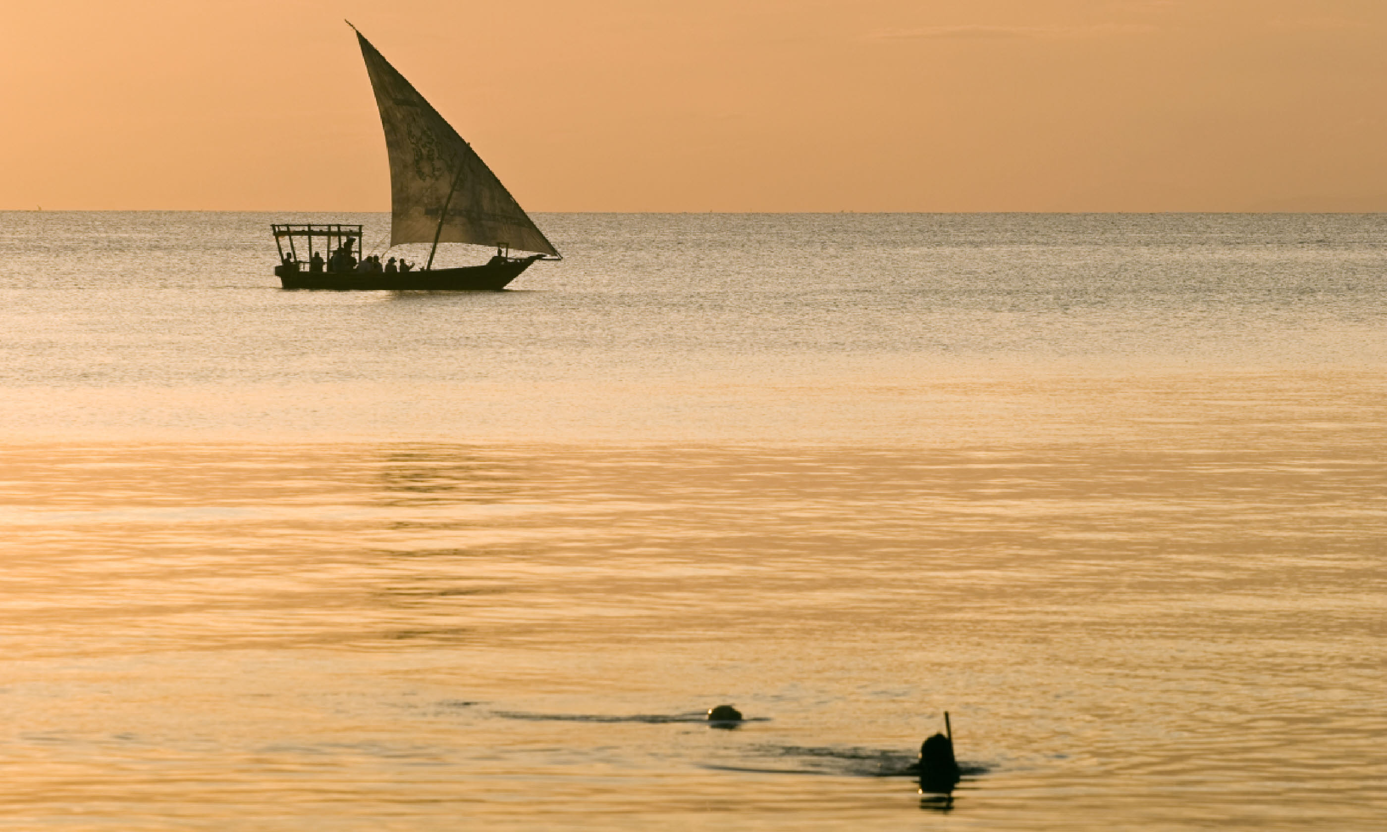 Sailboat and divers, Zanzibar (Shutterstock)
