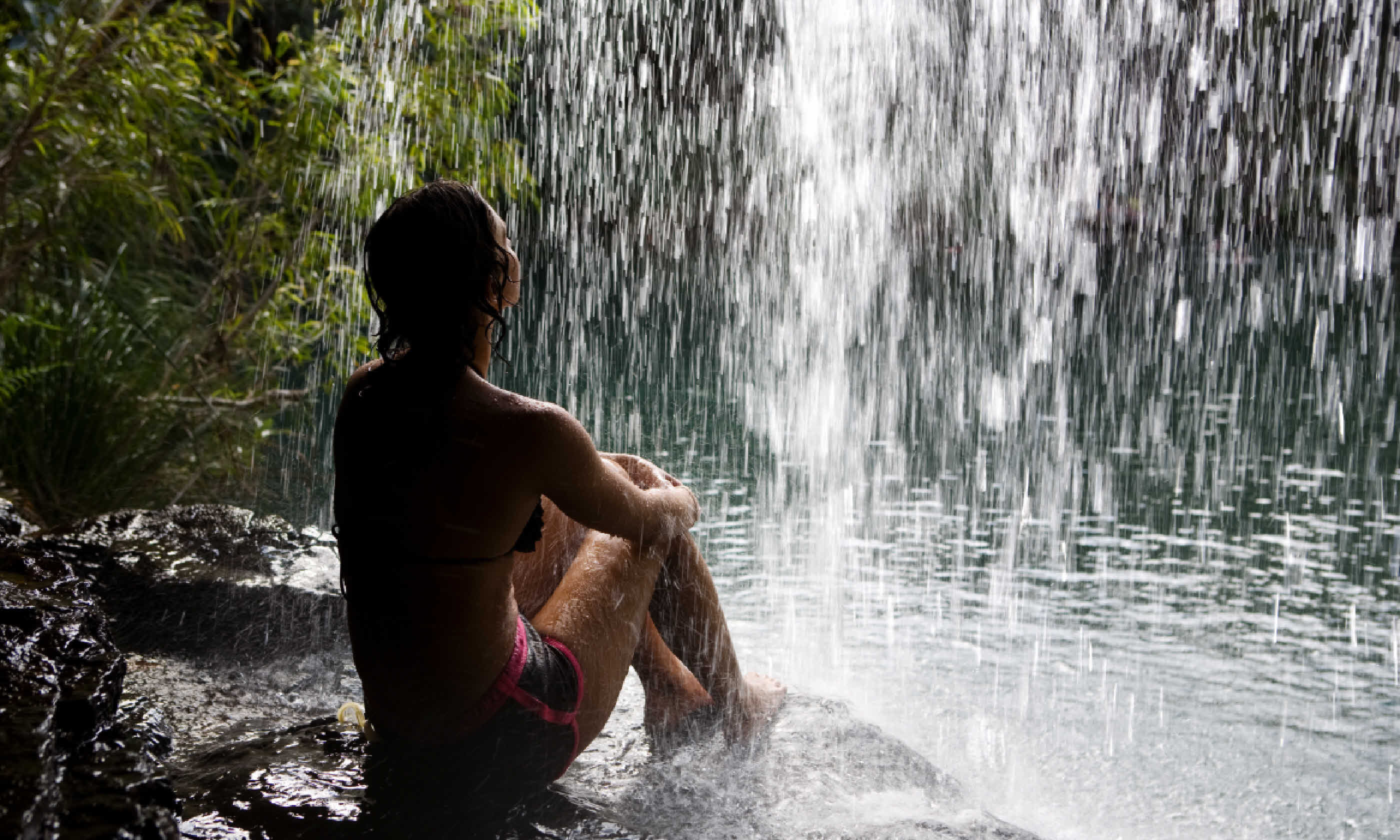 Under a waterfall, Karijini (Shutterstock)