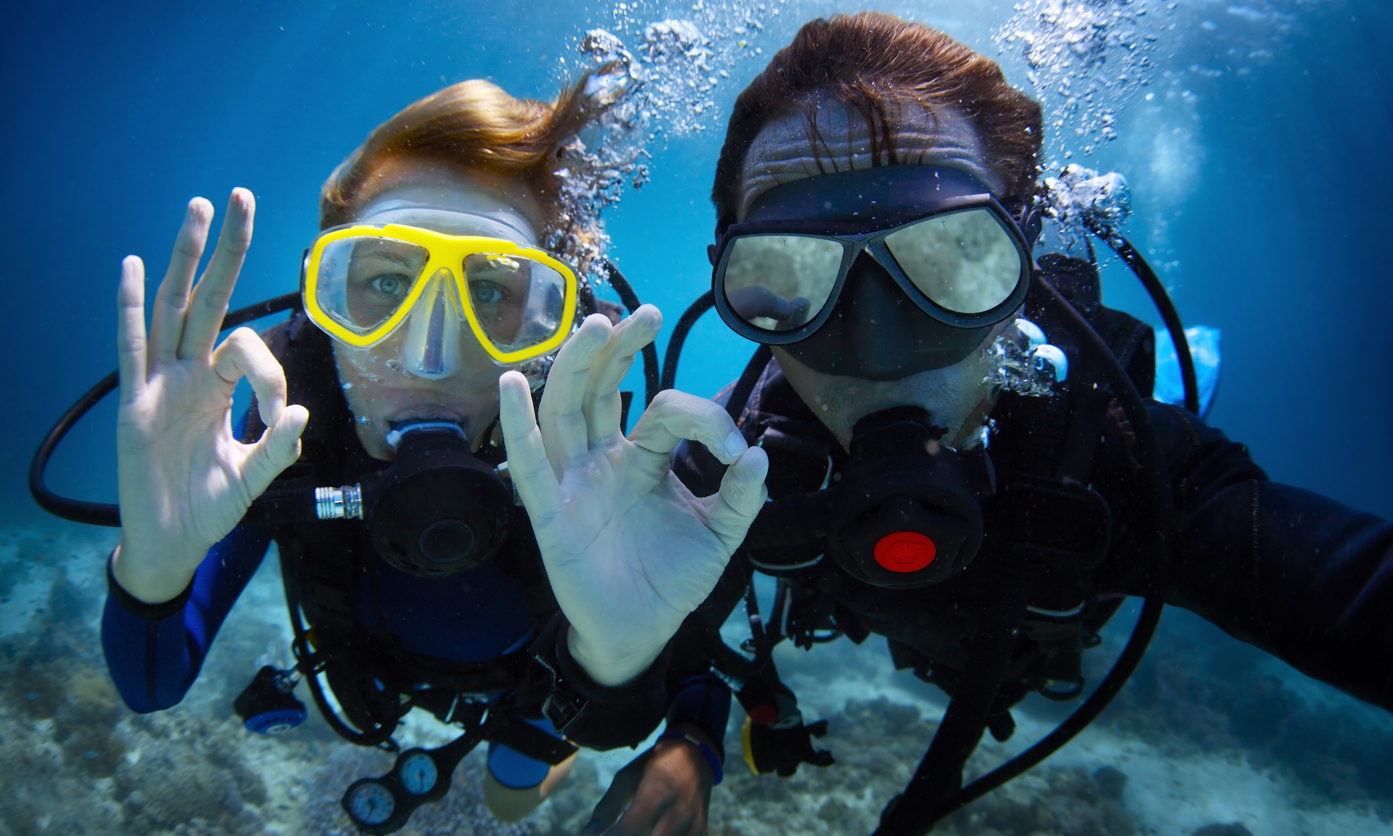 Young couple discover the joys of diving (Shutterstock: see main credit below)
