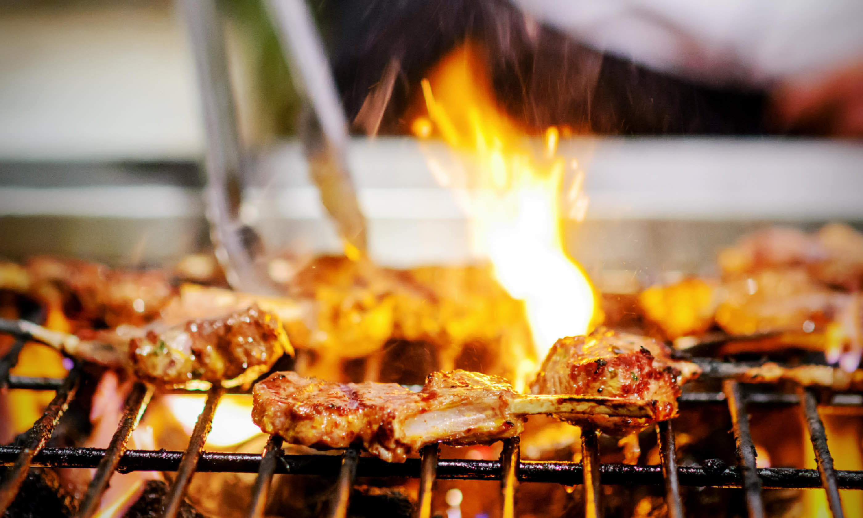 Lamb ribs on flame (Shutterstock)