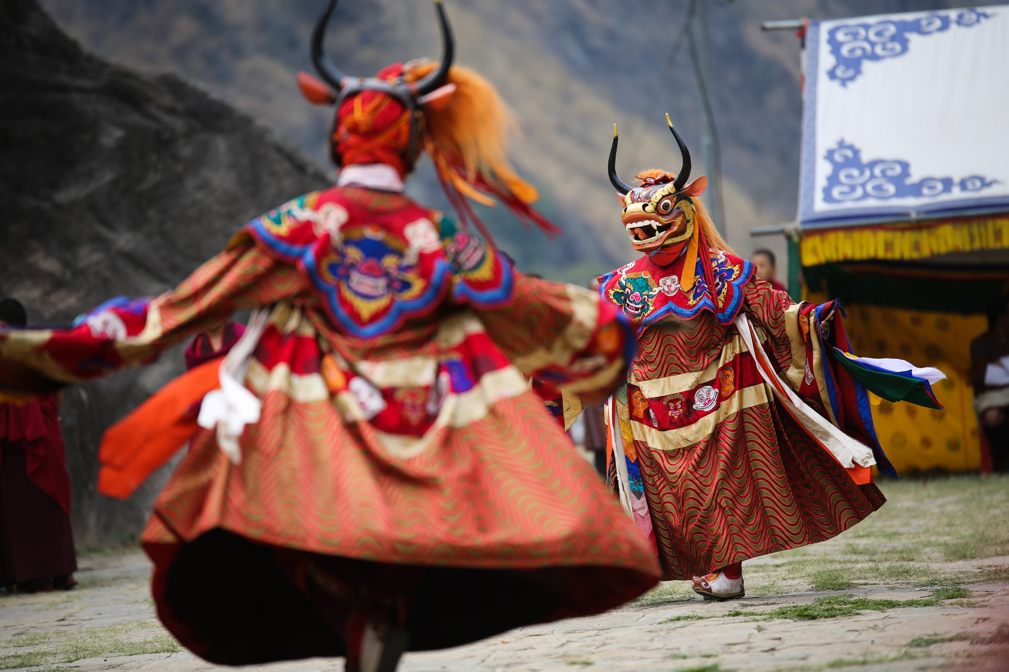 Masked dancers in Bhutan (Shutterstock.com)