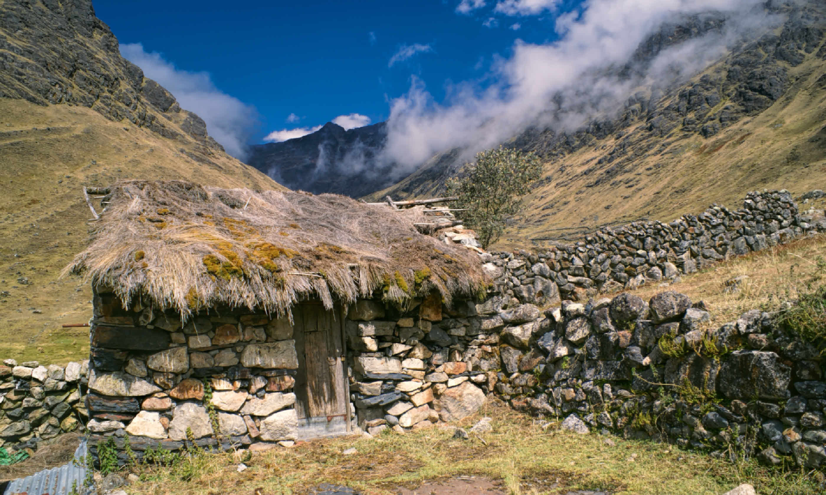 Traditional old stone hut in Andes mountains in Bolivia (Shutterstock)