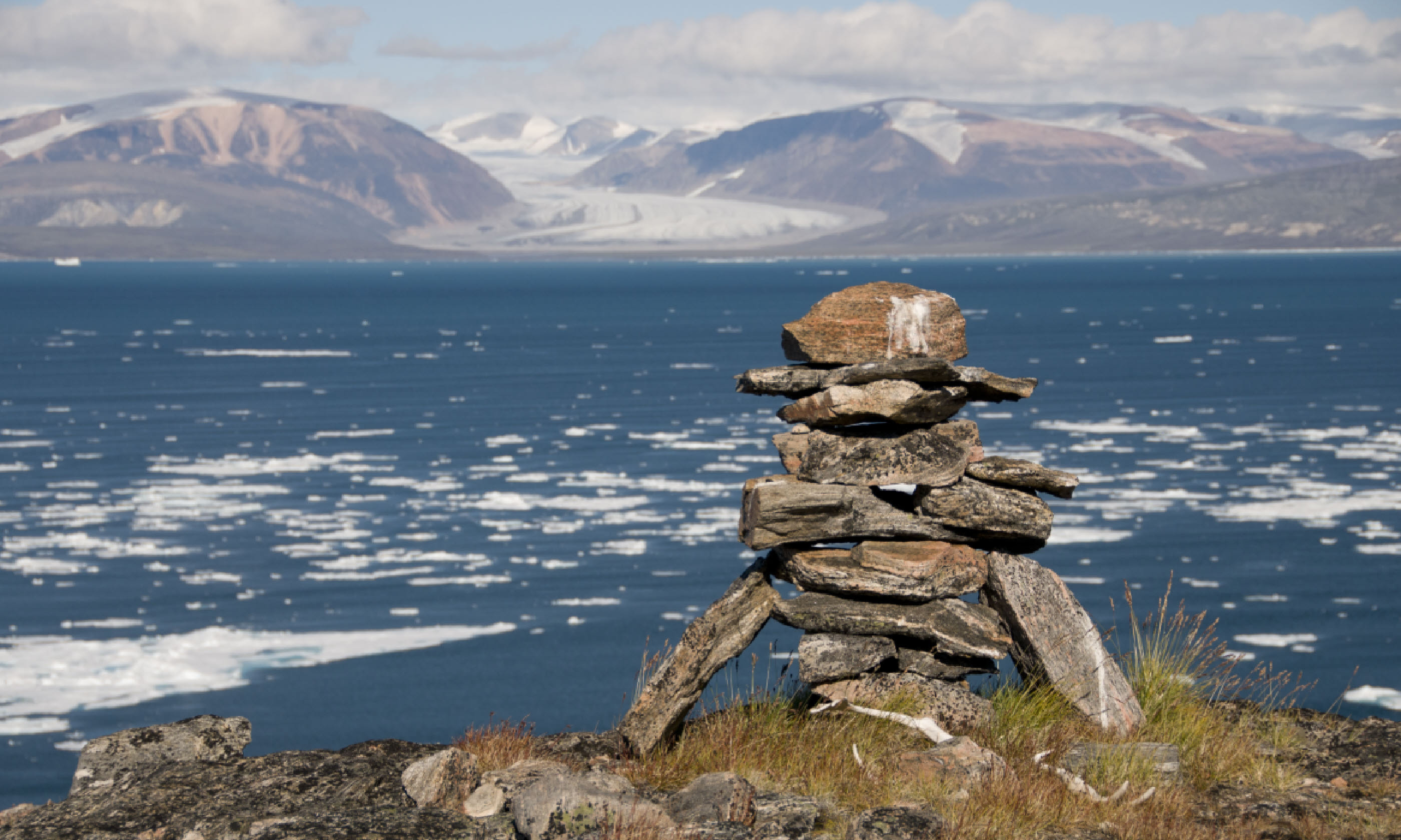An ancient Inuit inukshuk serves as a landmark for seafarers (Shutterstock)