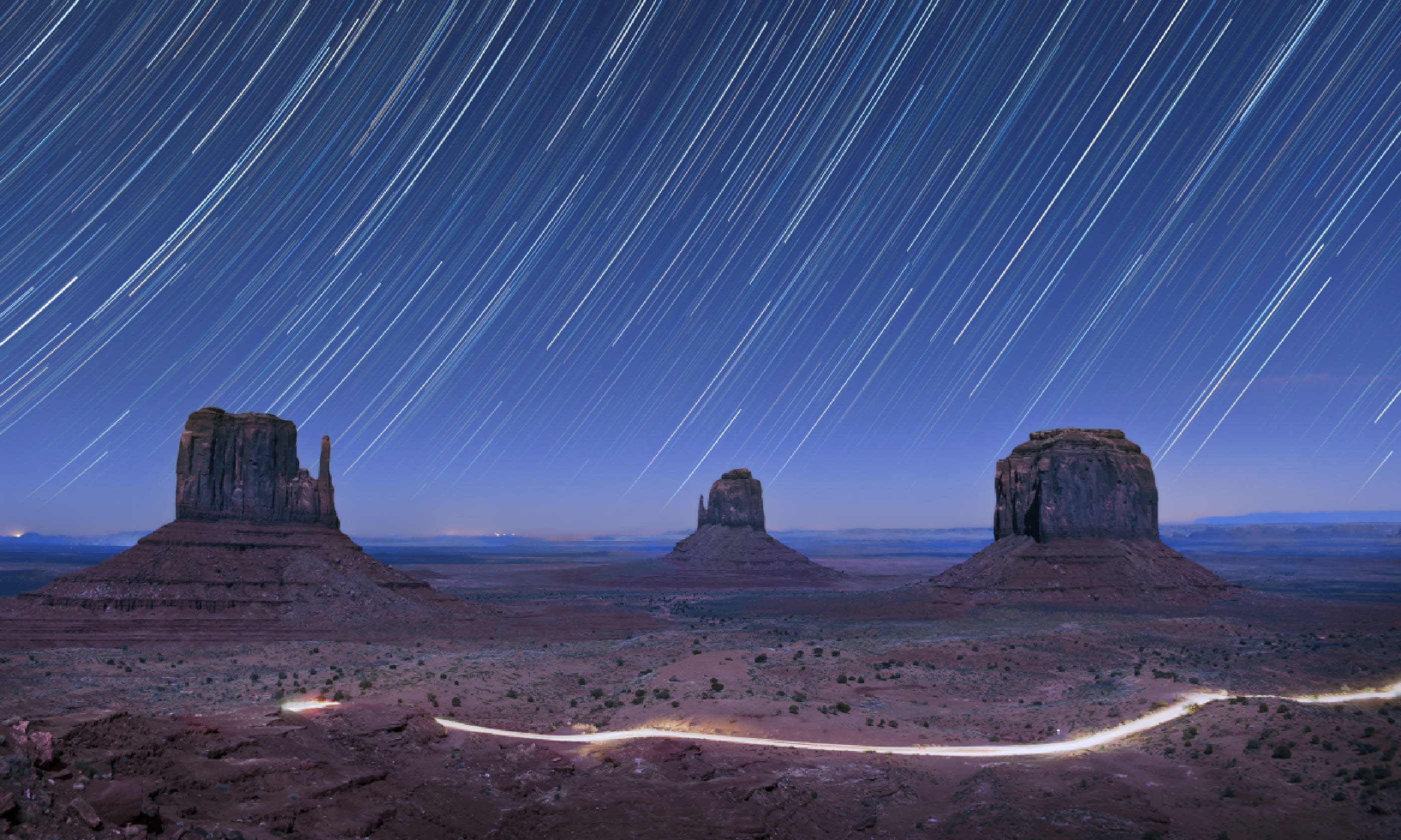 Star trails in the night over Monument Valley, USA (Shutterstock: see credit below)