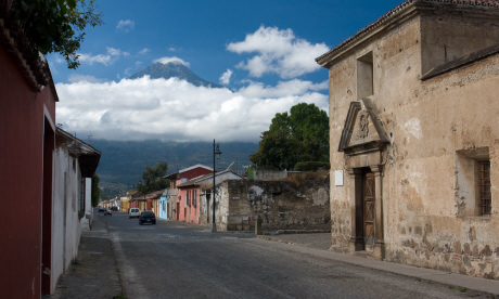 Volcán Agua looms over the streets of Antigua, Guatemala (Flickr: Greg Wills)
