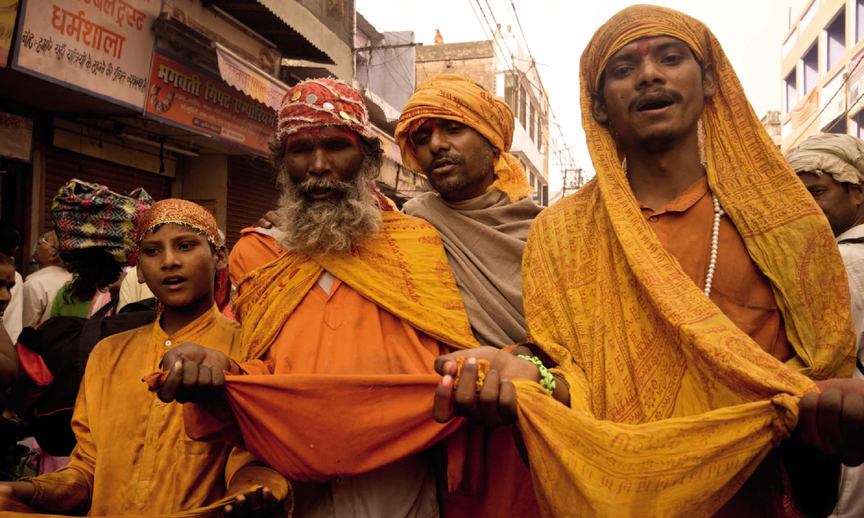 Receiving alms (Mark Stratton)