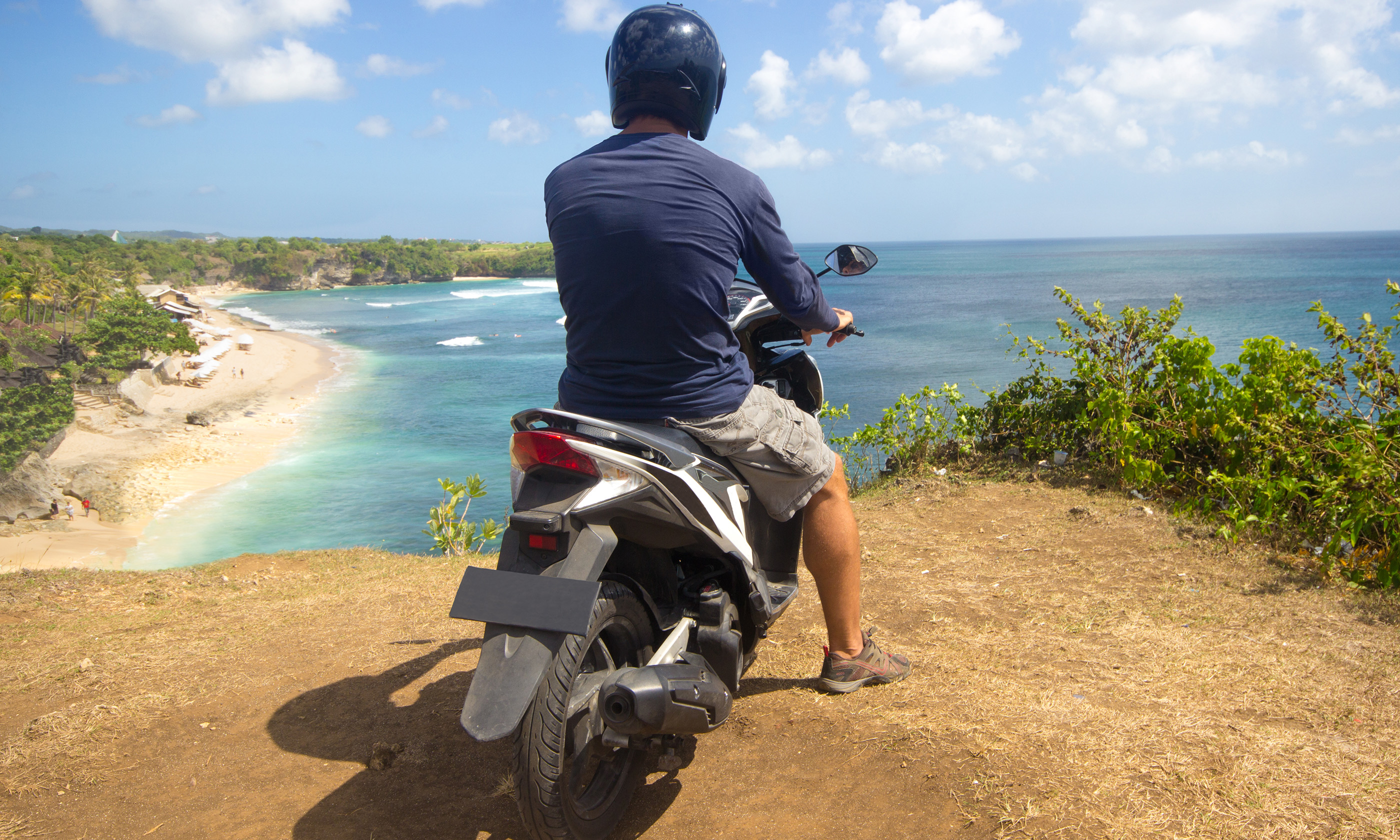 On a moped, overlooking a beach (Shutterstock: see main credit below)