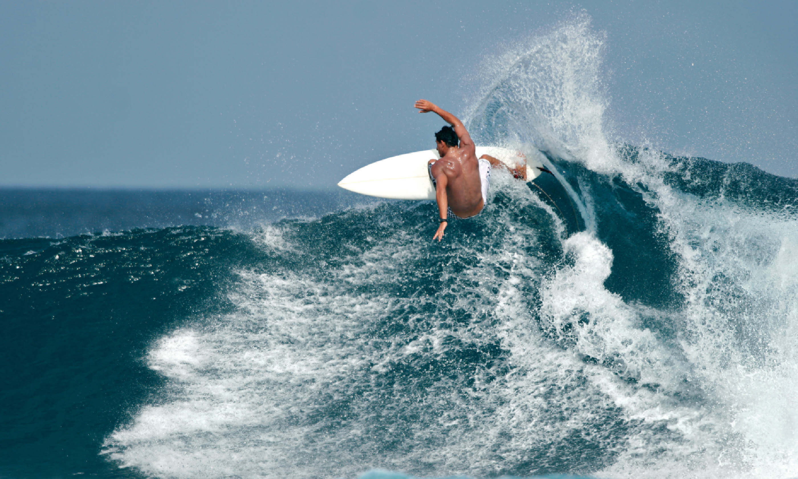 Surfer, Maldives (Shutterstock)