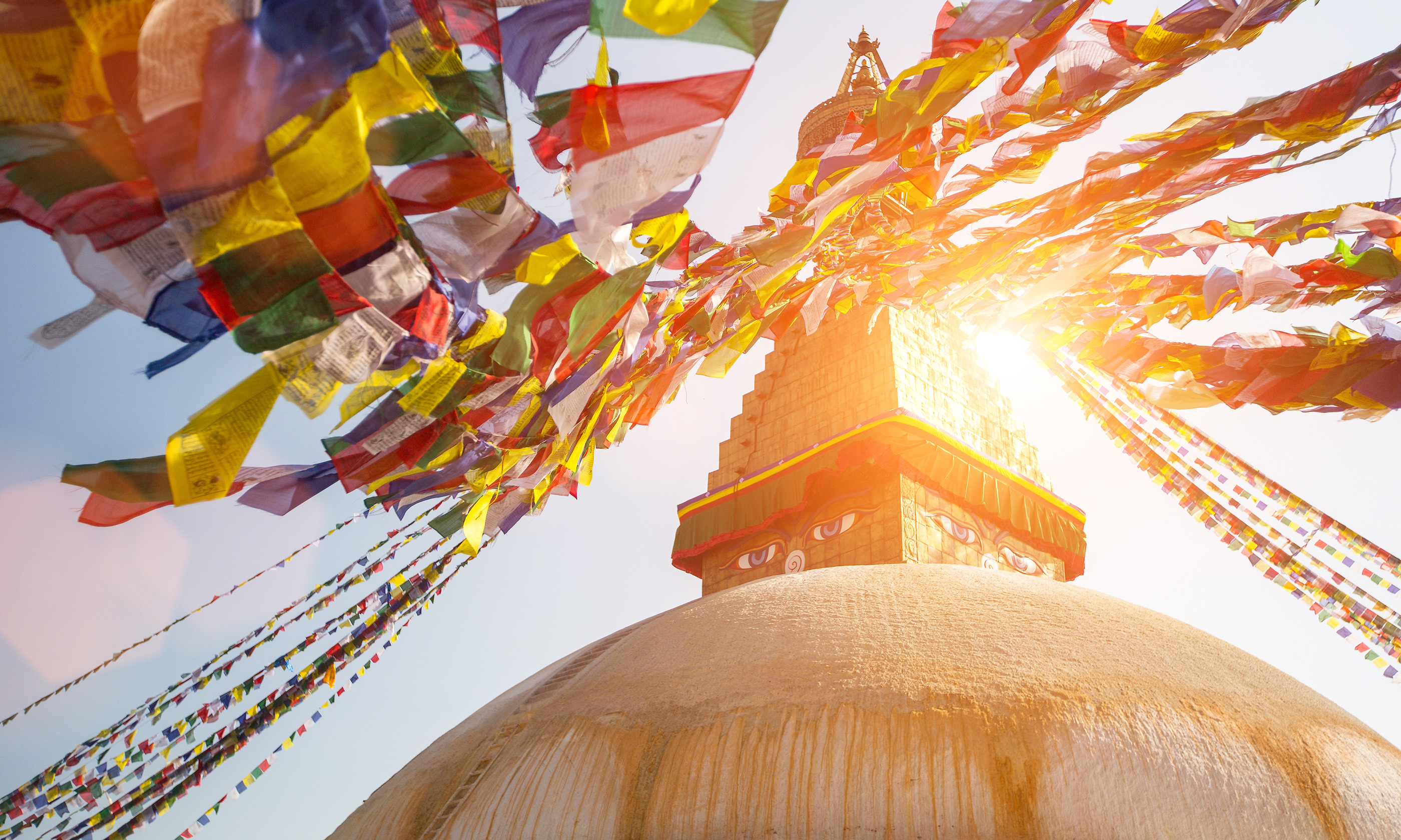 Bodnath Stupa sunshine (Shutterstock.com. See credit below)