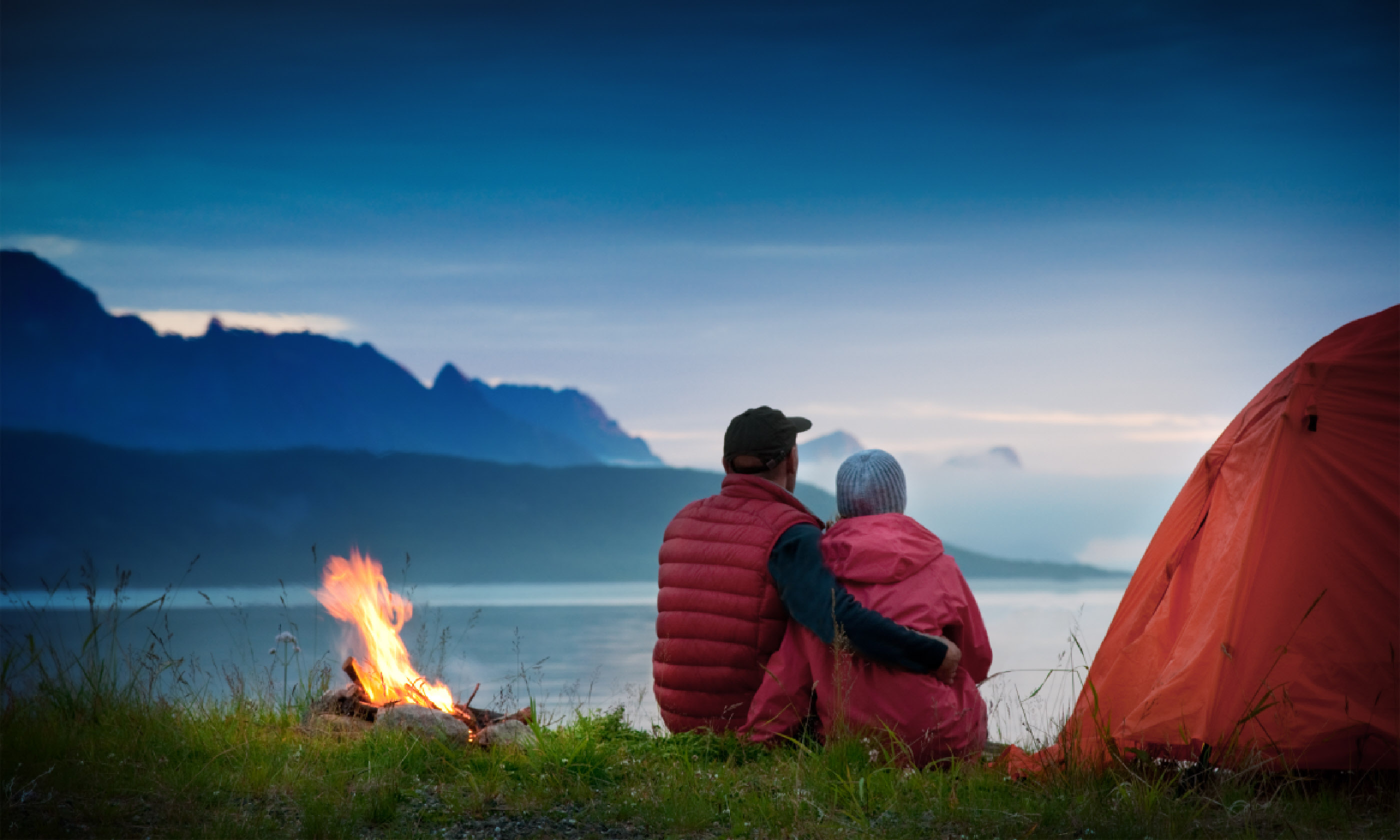 Couple with tent near seaside (Shutterstock: see credit below)