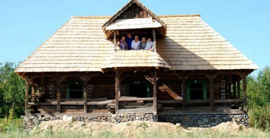 Duncan Ridgely,Penny Ridgely and family, authors of family travel book, Somewhere Different, in one of the houses they built in Romania.