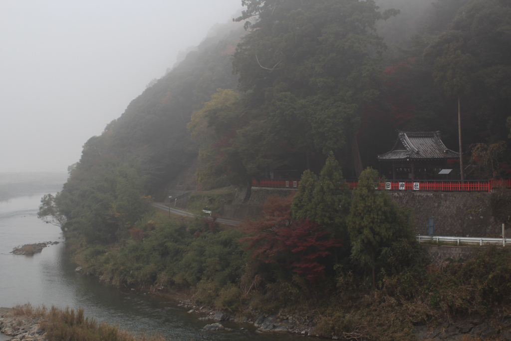 Shinto shrine by the Hozu River, in the mist
