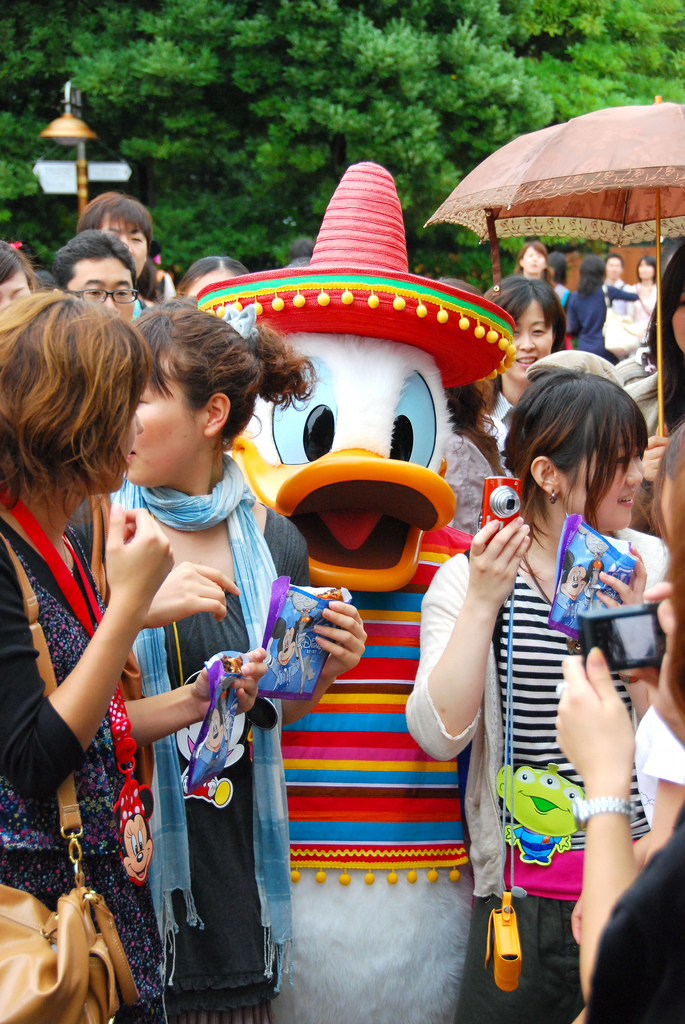 Donald Duck mingling with the crowd