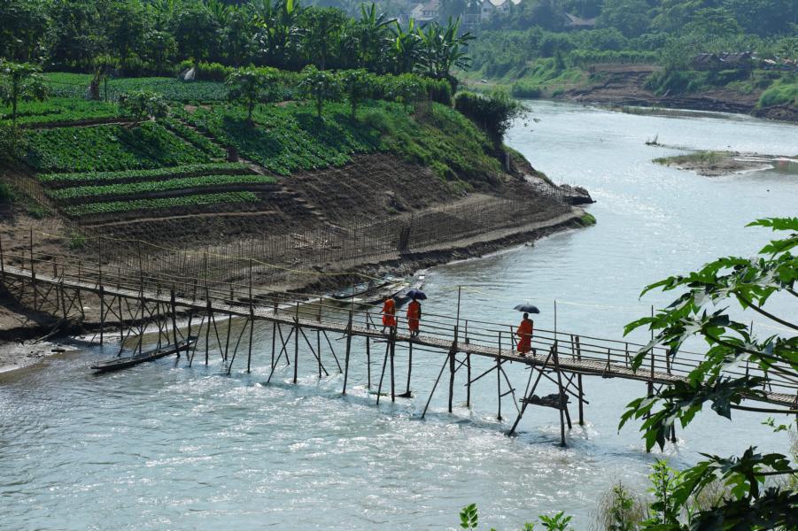 Monks on Bridge Luang Prabang Laos