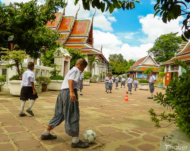 School-children play football at Wat Pho, Bangkok