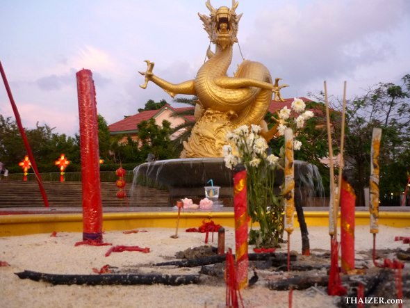 Incense, candles and offerings to honour Hai Leng Ong in Phuket