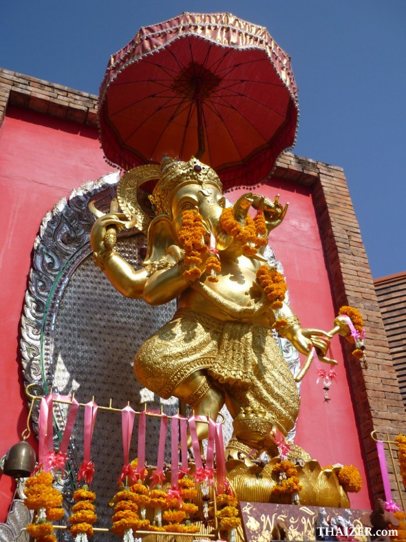 statue of dancing Ganesh outside a business in Chiang Mai