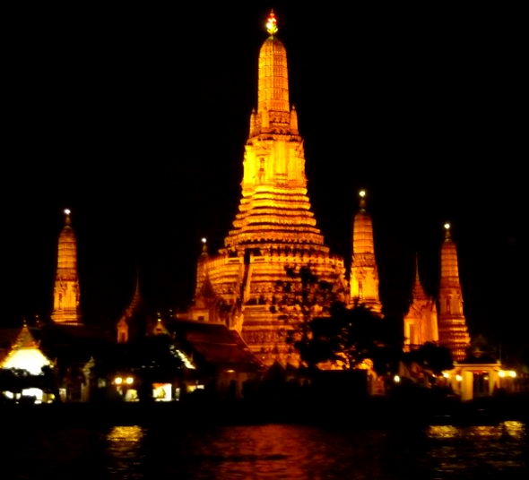 Wat Arun in Bangkok lit up in gold colours at night