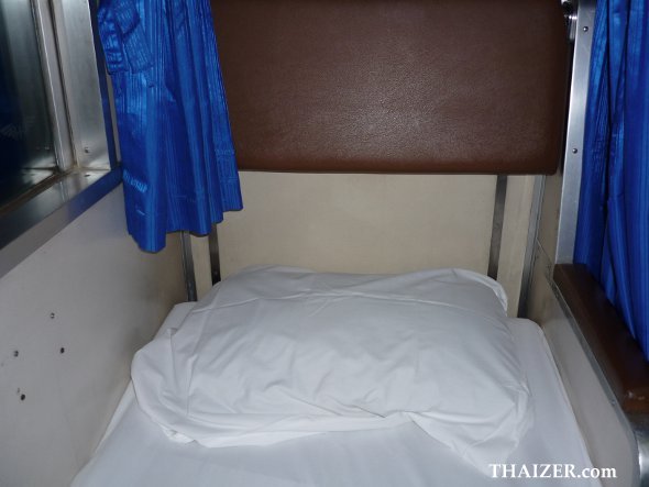 lower berth bunk in second class sleeper carriage