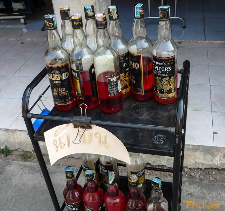 gasoline in whisky bottles in Thailand