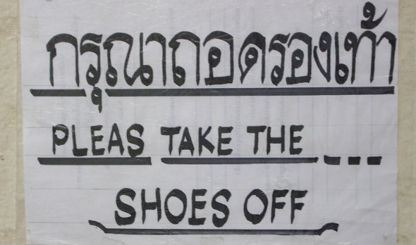 take off shoes sign at temple in Chiang Rai