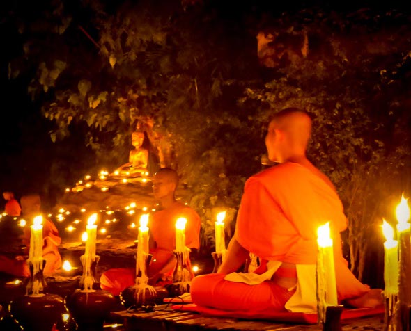 Novice monks meditating on the eve of the Phansa rains retreat