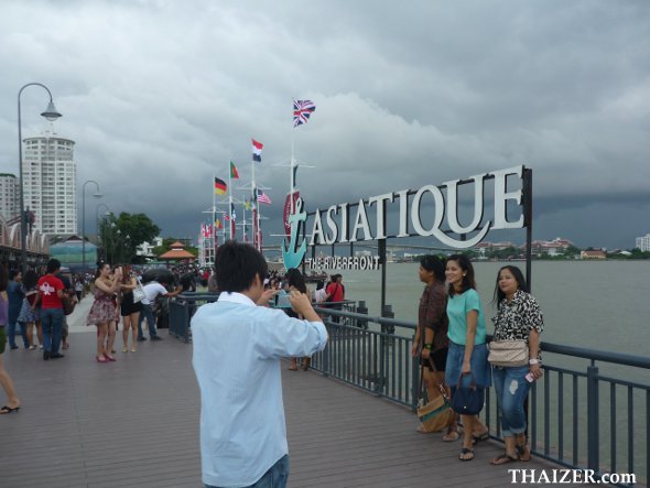 posing by the Asiatique Riverfront sign