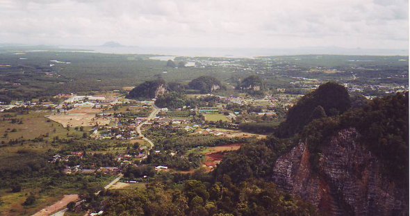 View from mountain on top of Wat Tham Seua looking out to the Andaman Sea in the distance.