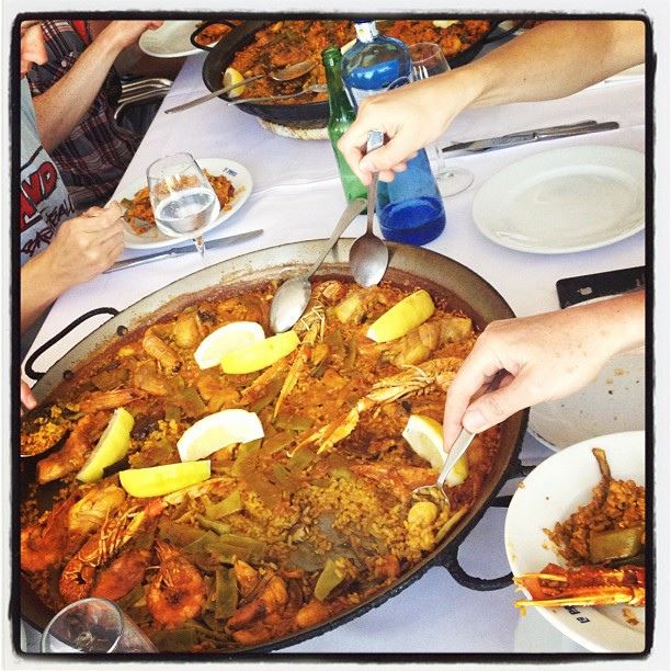 paella rice seafood sharing paellera