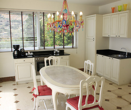 Elounda Gulf Villas villa dining room and kitchen