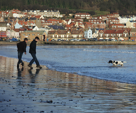 Playing in the sea on Scarborugh South Beach