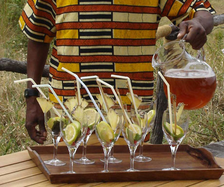 Beho Beho waiter pouring drinks