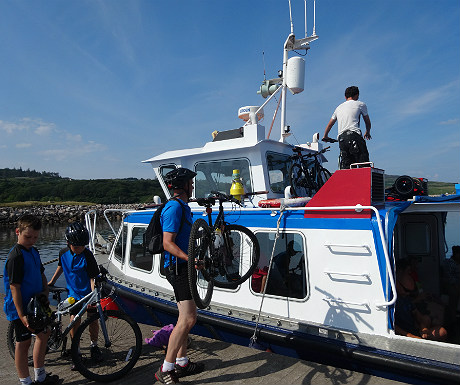 Loading bikes on to MV Sheerwater 2