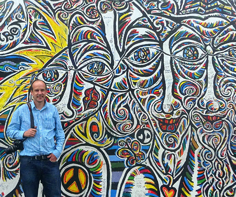 Me outside the Berlin Wall