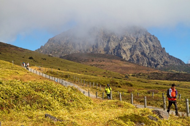 Hikers below the summit of Hallasan, South Korea's highest mountain.